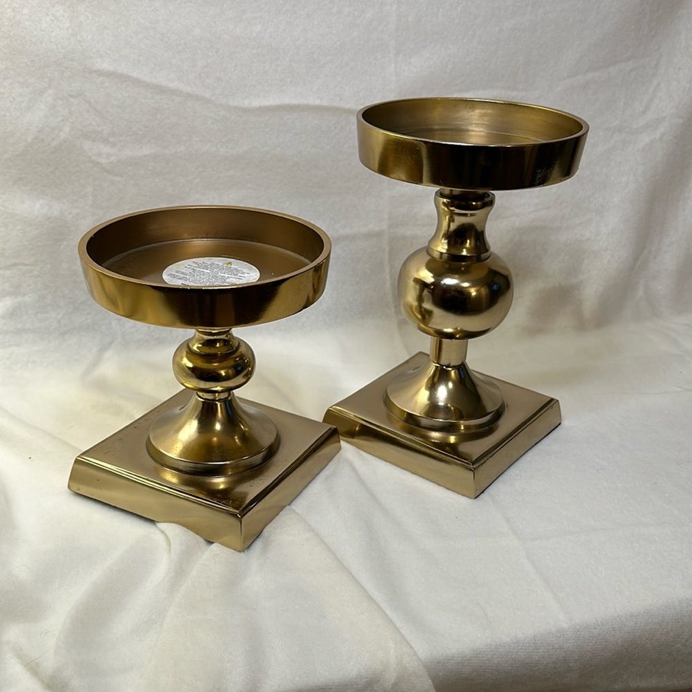 Candle holders. Brass. Made in India 5” diameter. 6” and 8. “ in height